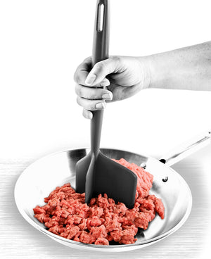 meat chopper being used to brown ground beef in a skillet