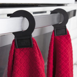hook and hang towel displayed hanging from oven door handle